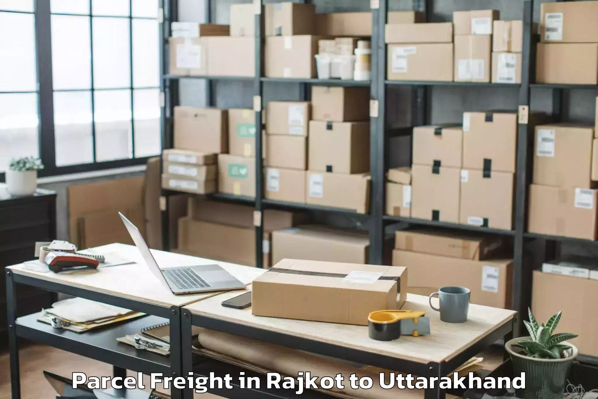 Book Rajkot to Thalisain Parcel Freight Online